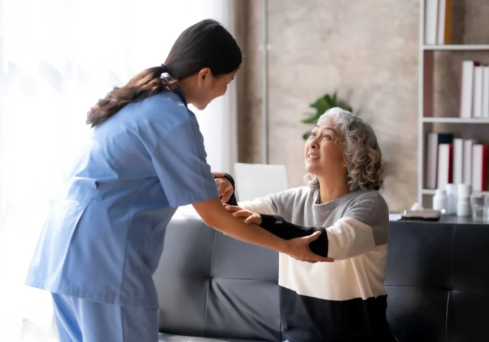asian-female-doctor-or-nurse-gently-guide-and-care-2023-11-27-05-36-20-utc