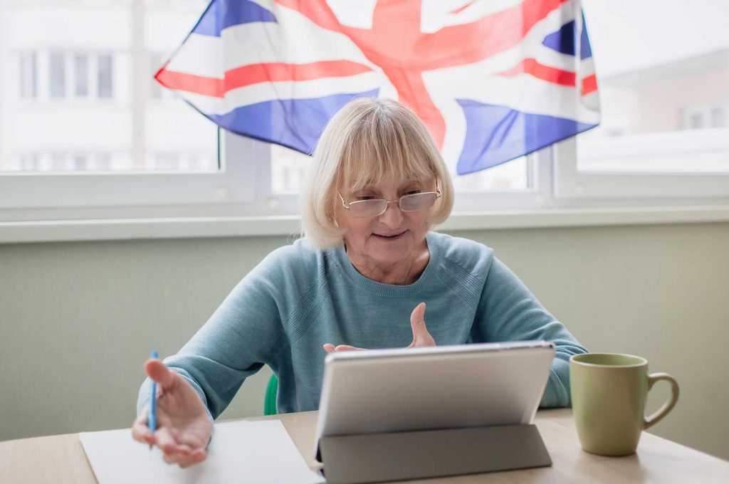 senior-woman-learns-english-via-internet-with-lapt-2022-03-16-07-10-56-utc